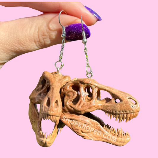 realistic fossil dinosaur skull earrings 